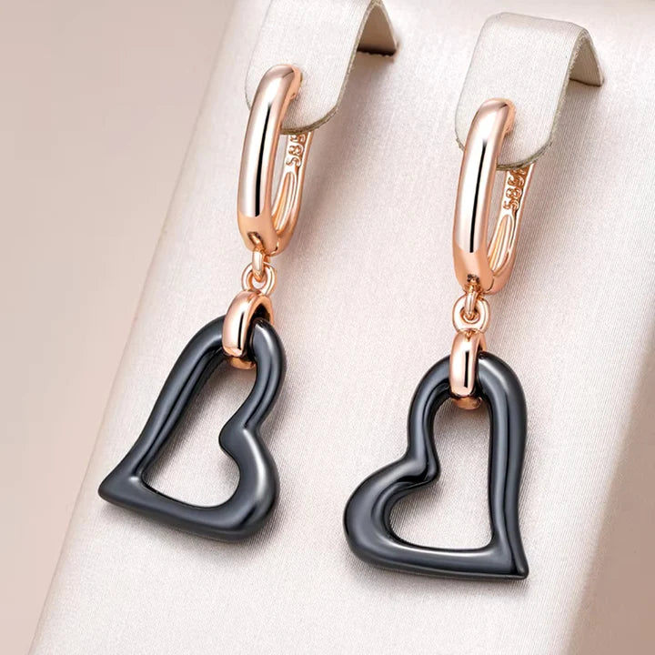Boucles d'oreilles élégantes en forme de cœur noir – Paradise Designs