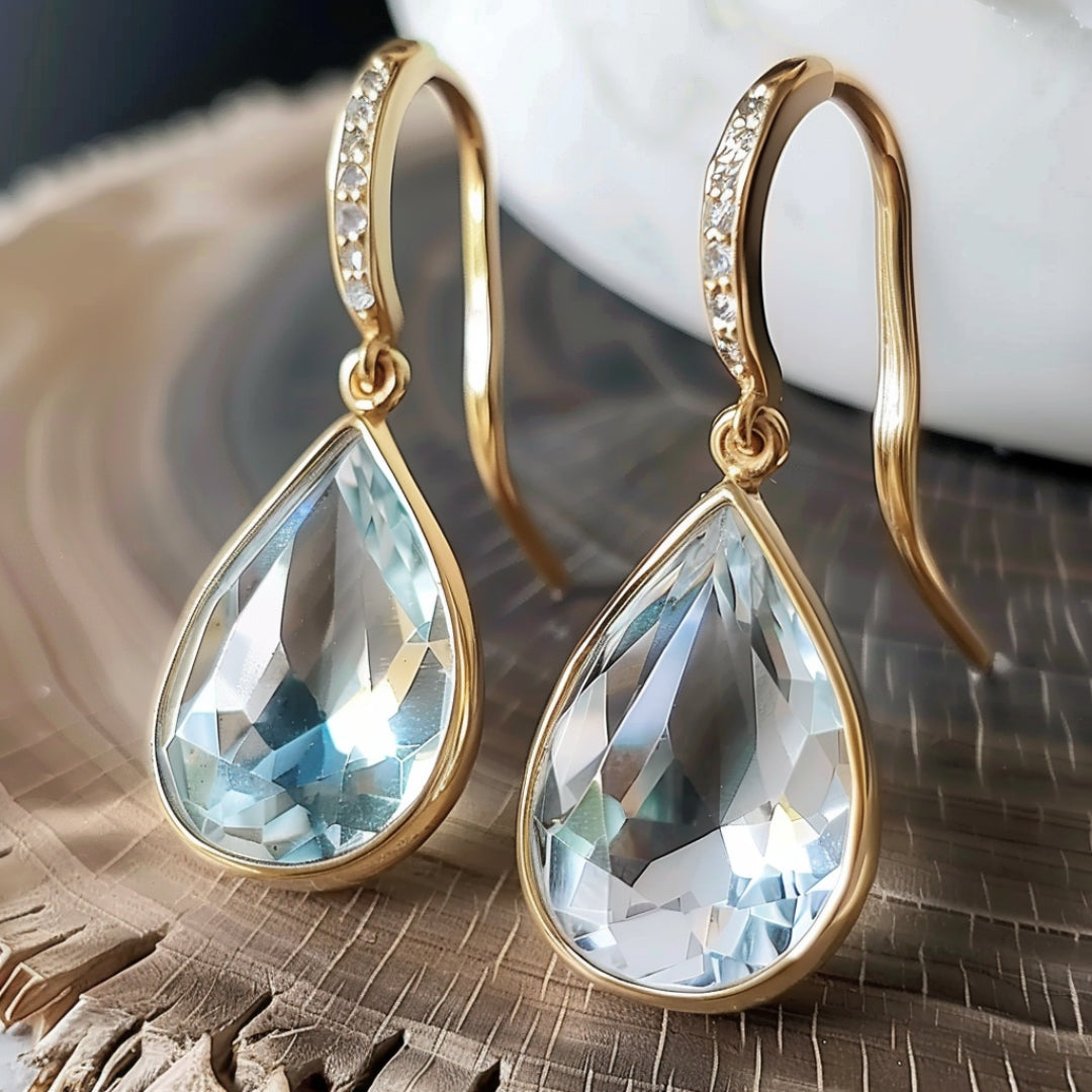 Boucles d'oreilles gouttes de cristal bleu doré