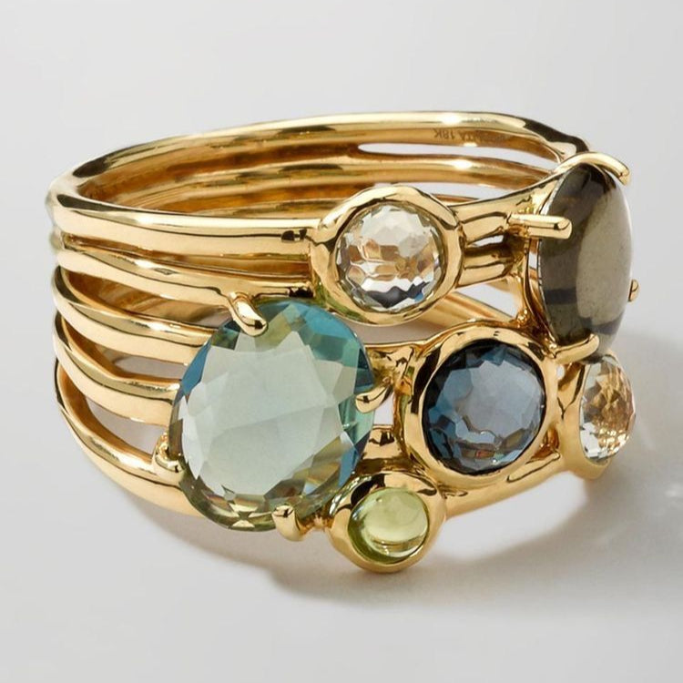 Bague en or avec pierres colorées superposées