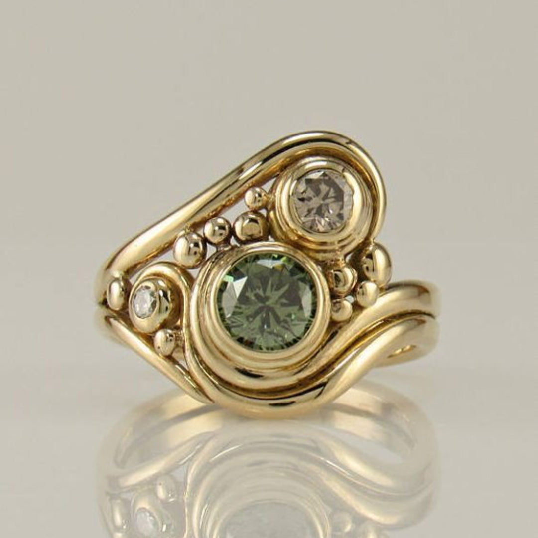 Bague vintage en zircon vert doré