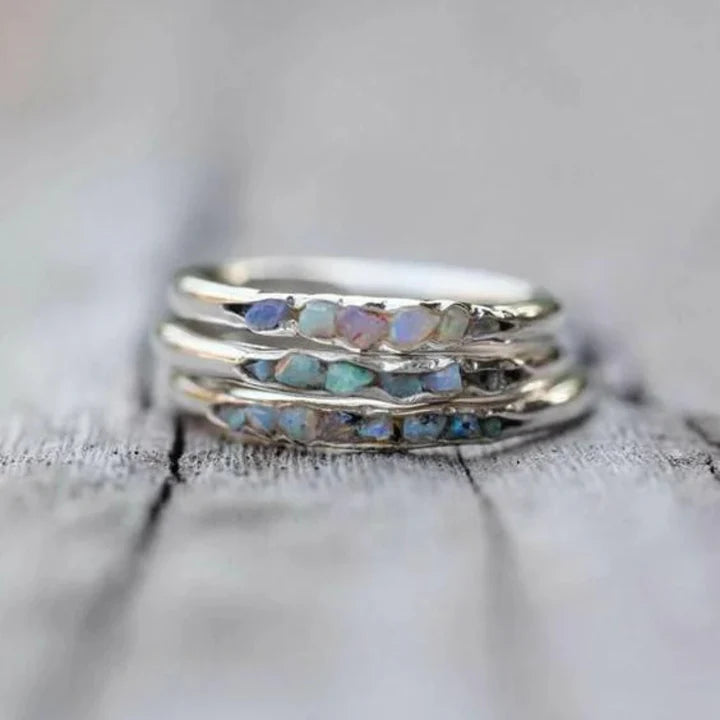 Bague en argent incrustée d'un cœur en or