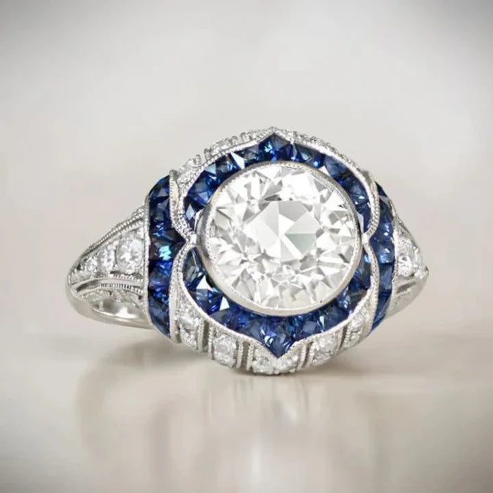 Bague en argent avec cristaux blancs et bleus arrondis