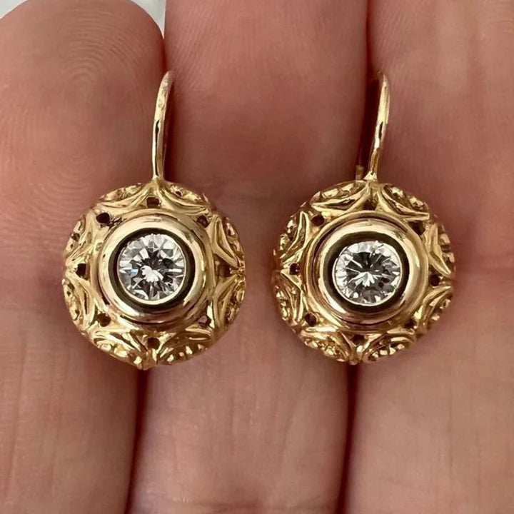 Boucles d'oreilles rondes en verre blanc et or