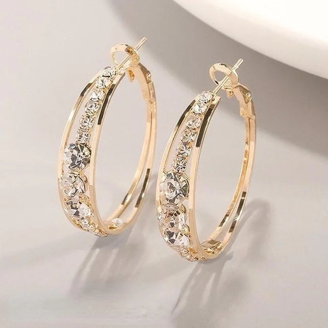 Boucles d'oreilles élégantes et brillantes en or