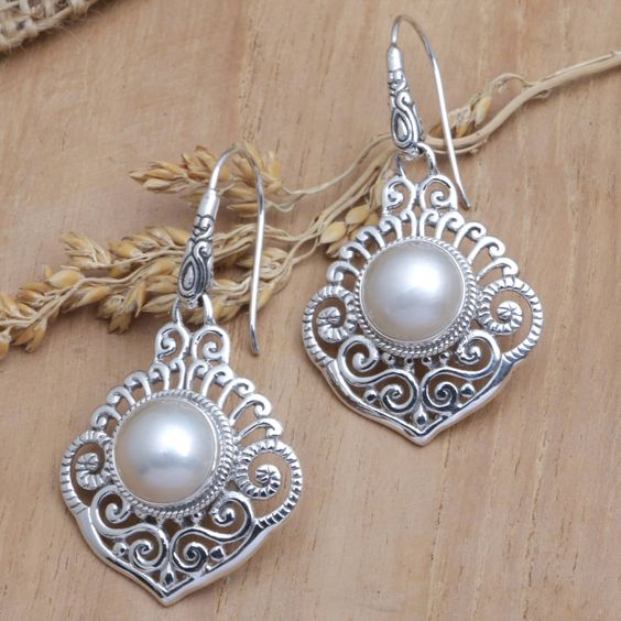 Boucles d'oreilles vintage en argent avec perles creuses