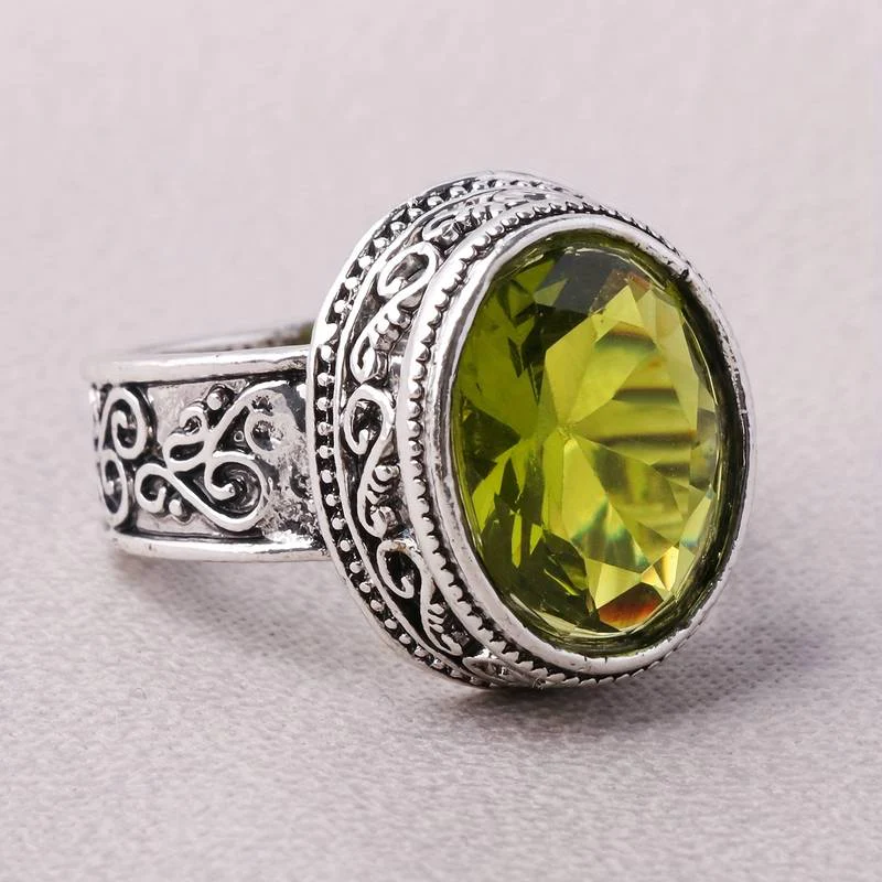 Bague en cristal olive en argent vintage