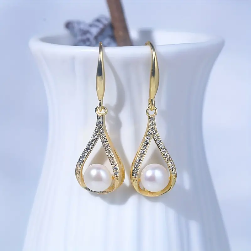 Boucles d'oreilles perle blanche avec diamants en or