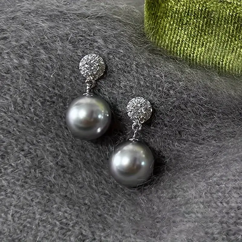 Boucles d'oreilles élégantes en perles noires avec strass