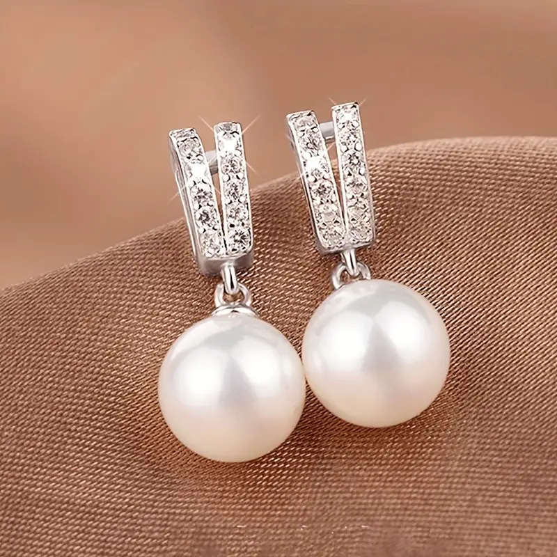 Boucles d'oreilles élégantes en perles avec strass