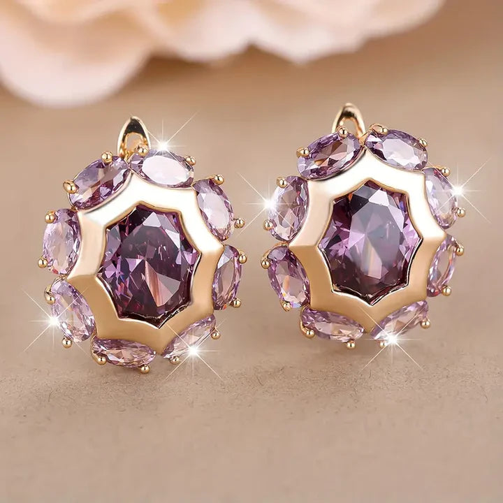 Boucles d'oreilles or à zircons violets arrondis