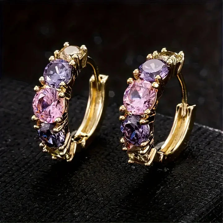 Boucles d'oreilles en or avec zirconium violet