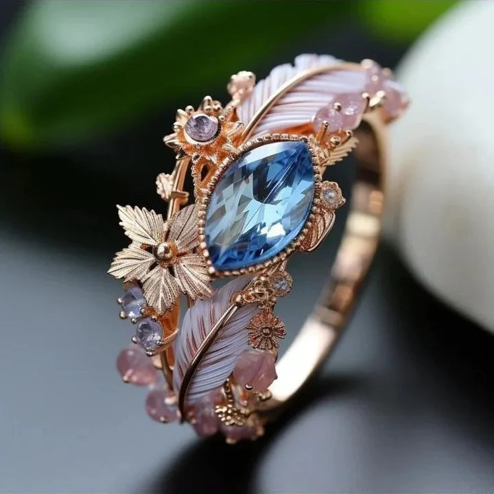Bague plume exotique en cristal bleu