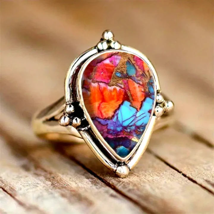 Bague à pierres incrustées colorées