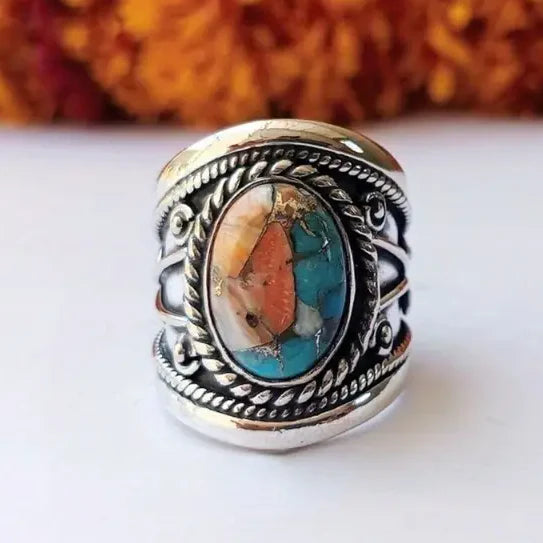 Bague à pierres incrustées colorées