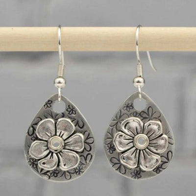 Boucles d'oreilles argentées florales boho