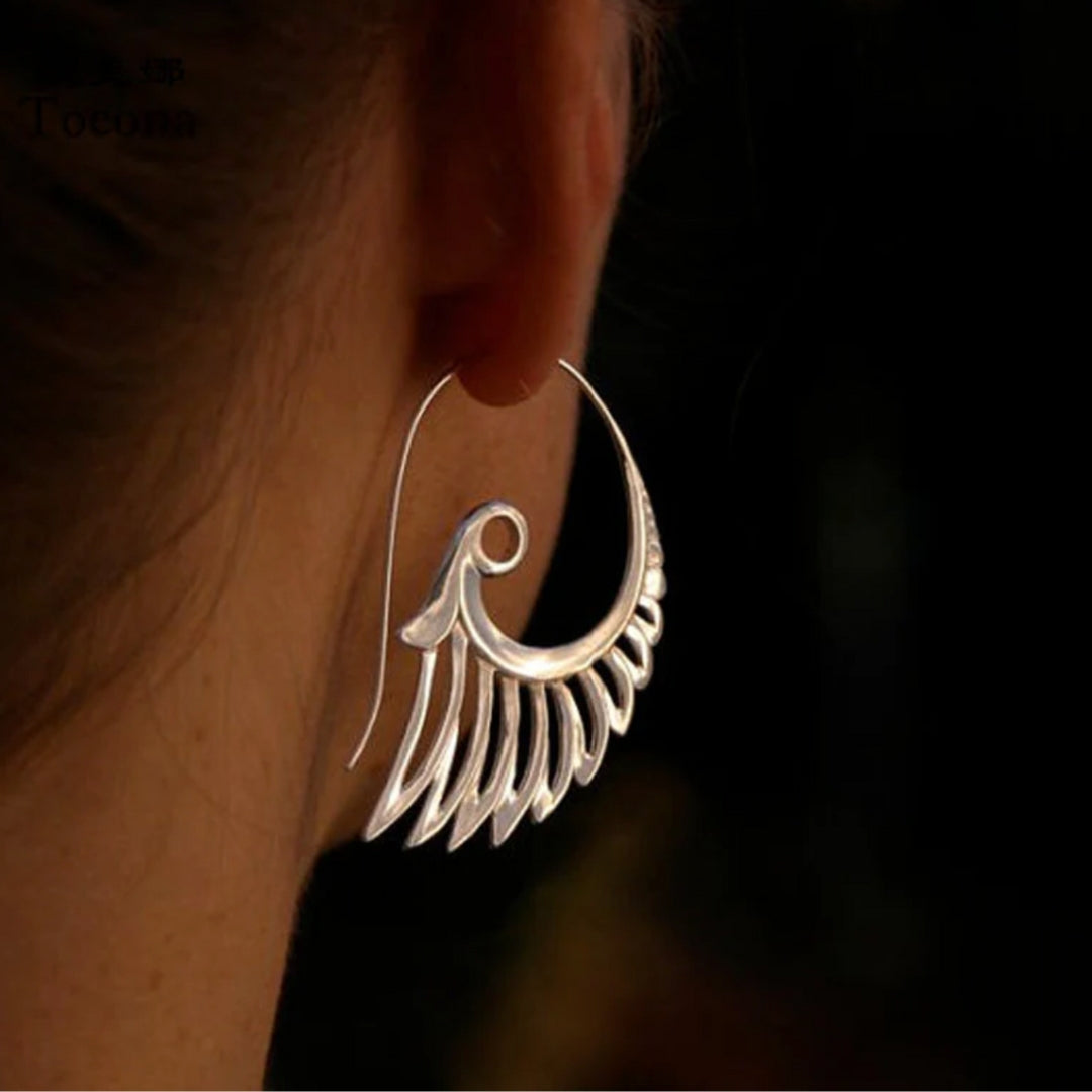 Boucles d'oreilles avec des ailes en or