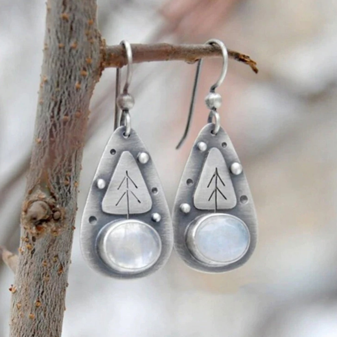 Boucles d'oreilles bohème en argent et opale blanche