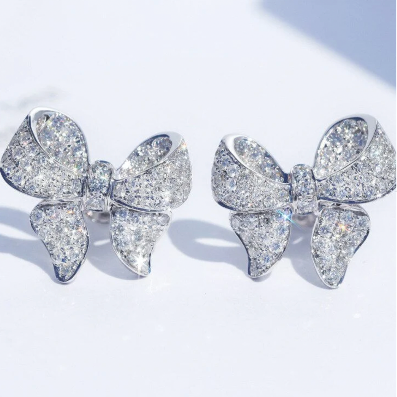 Boucles d'oreilles Nœud Brillant en Argent