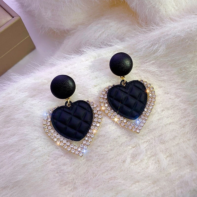 Boucles d'oreilles coeur noir en or