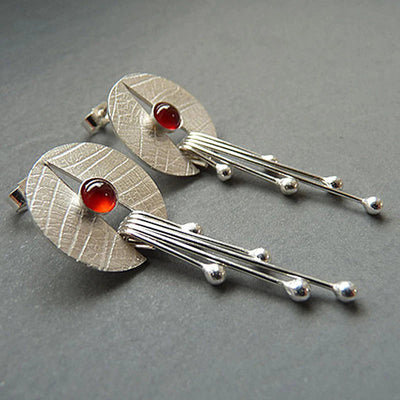 Boucles d'Oreilles Pendantes en Pierre Rouge Creuse