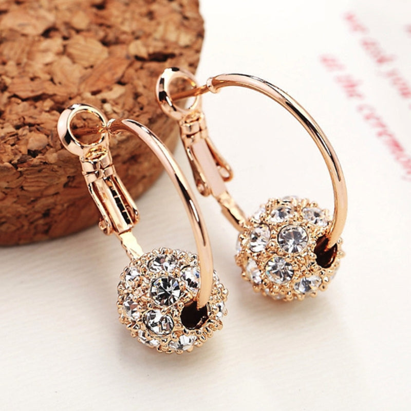 Boucles d'oreilles Sphères Brillantes Dorées