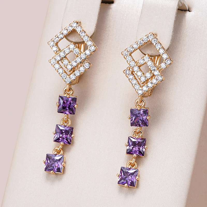 Boucles d’oreilles avec cristaux violets en or