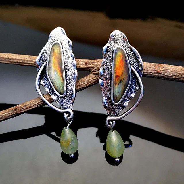 Boucles d'oreilles vintage avec pierre verte
