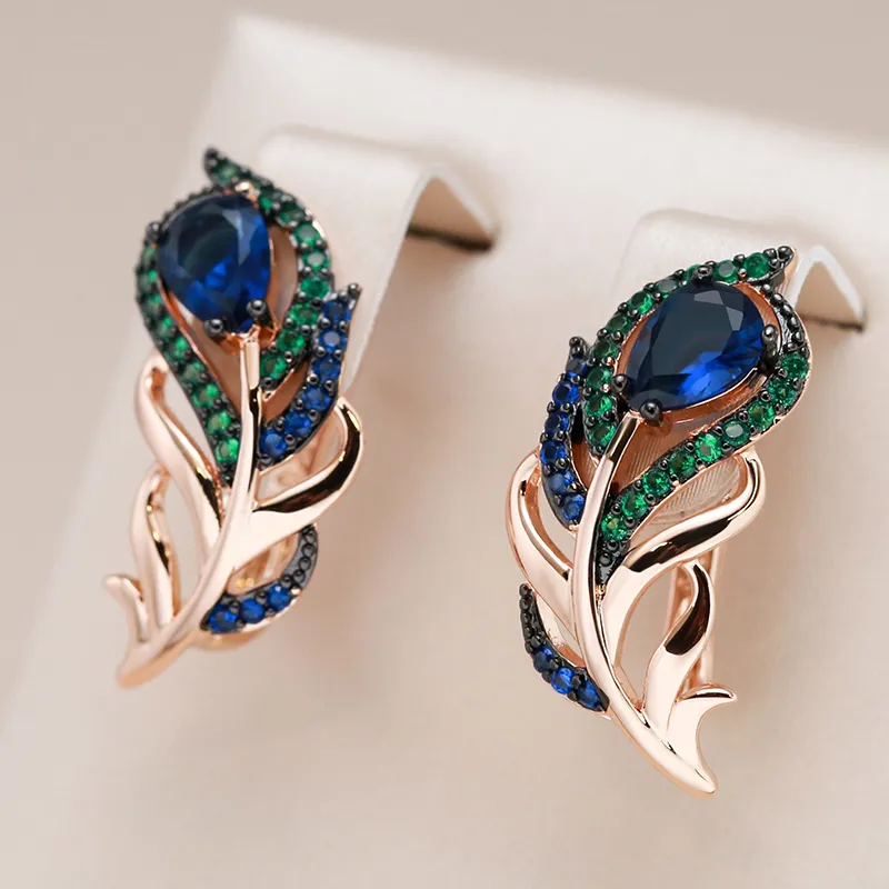 Boucles d'oreilles élégantes avec cristaux verts et bleus