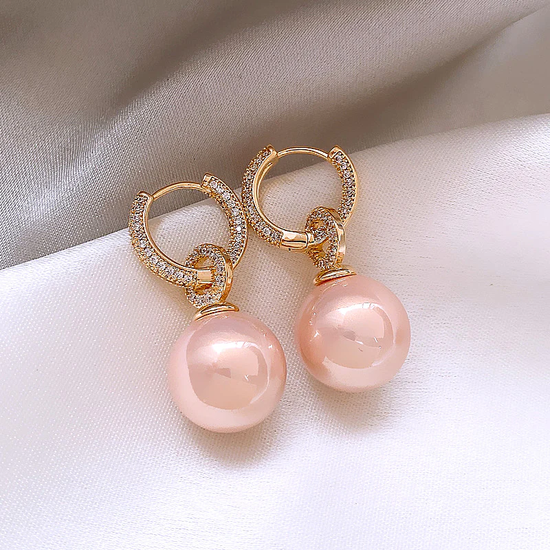 Boucles d'oreilles élégantes en perles roses