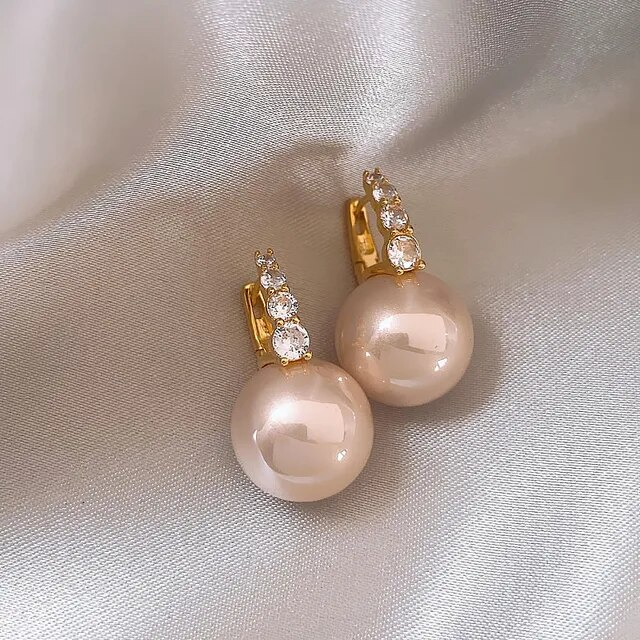 Boucles d'oreilles élégantes en perles roses