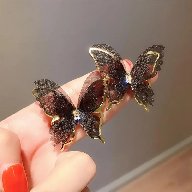 Boucles d'oreilles élégantes en forme de papillon noir