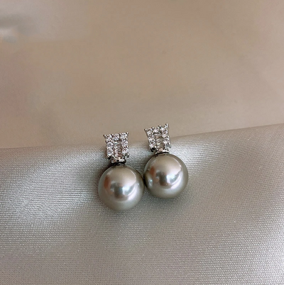 Boucles d'oreilles élégantes en perles de zirconium