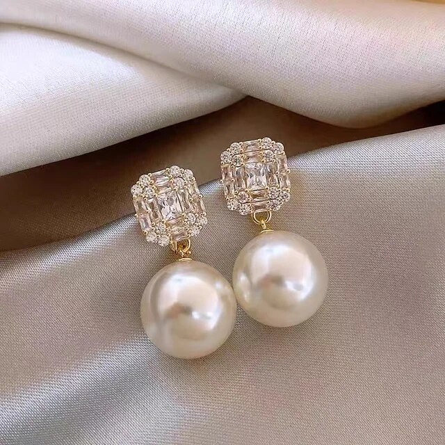 Boucles d'oreilles élégantes en perles de zircon cubique