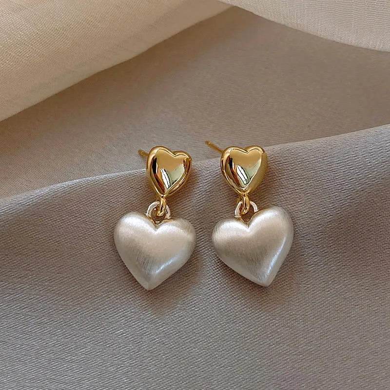 Boucles d'oreilles élégantes à double cœur