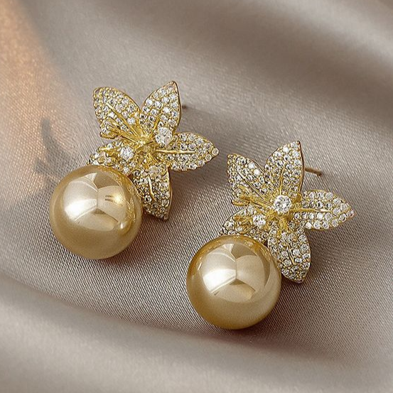 Boucles d'oreilles élégantes en perles de marguerite