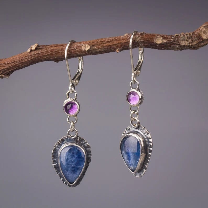 Boucles d'oreilles pendantes avec incrustation de cristal bleu