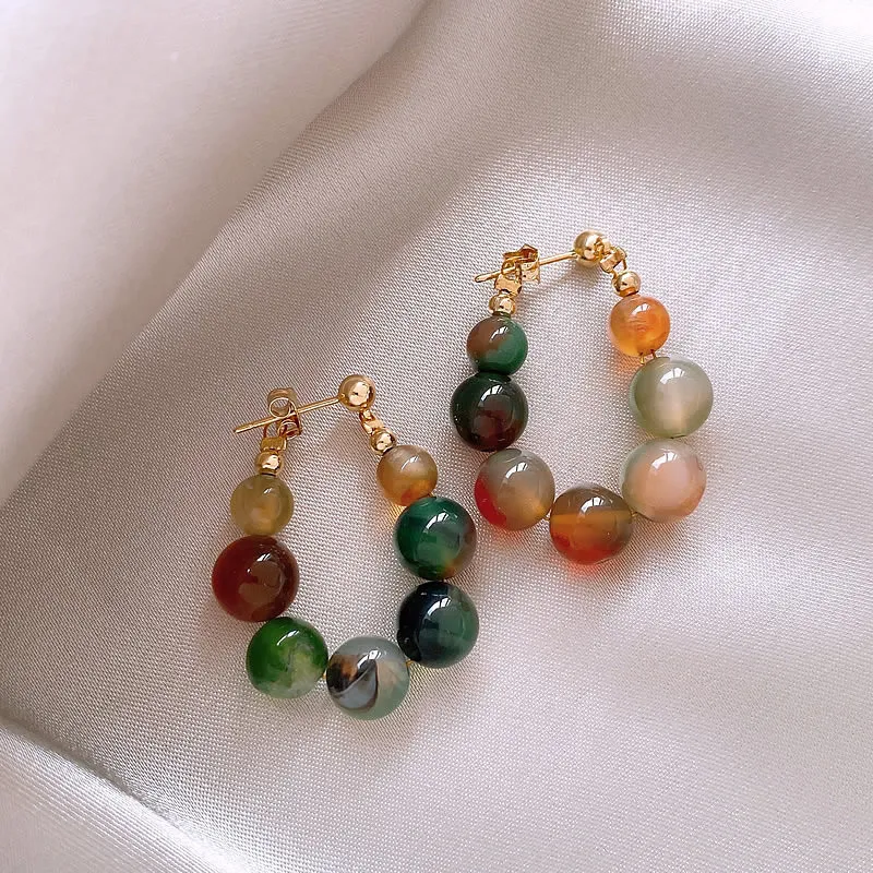 Boucles d'oreilles élégantes avec pierres de couleur