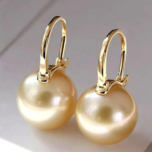 Boucles d'oreilles élégantes en perles d'or