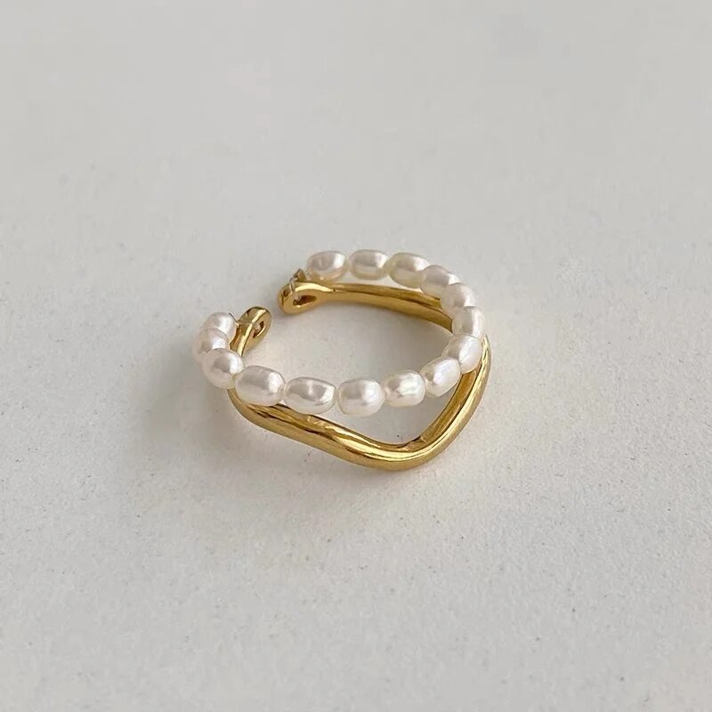 Bague élégante en or avec perles