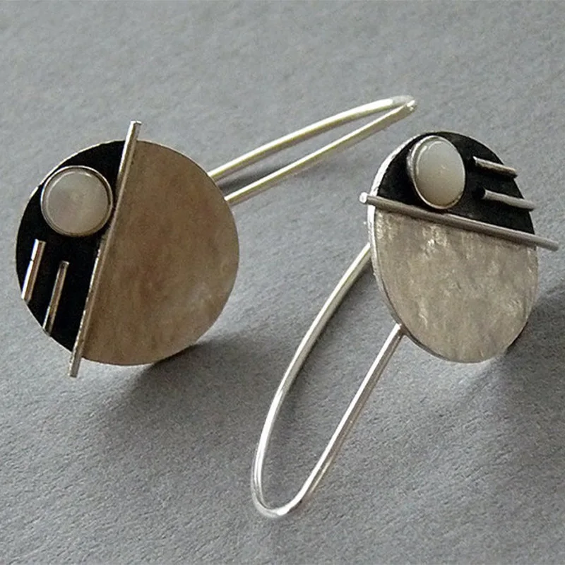 Boucles d'oreilles vintage avec opale blanche