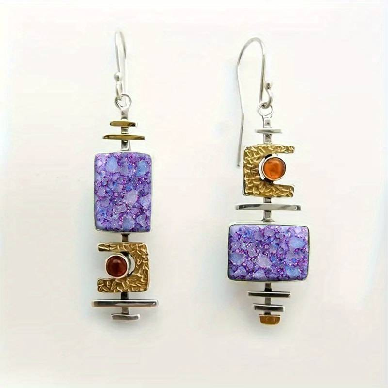 Boucles d'oreilles anciennes en pierre violette