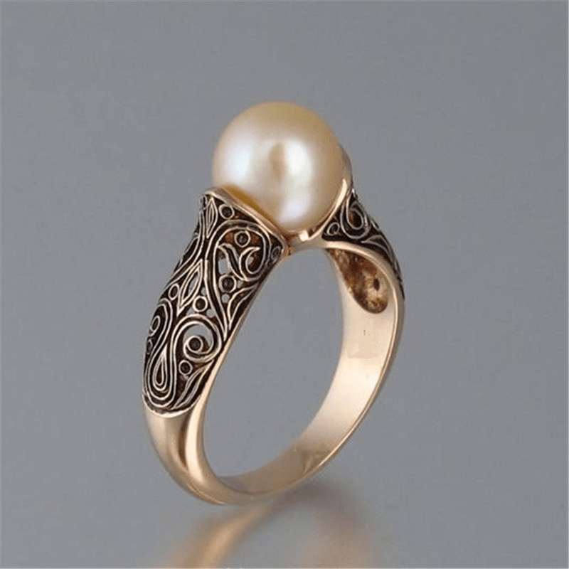 Bague vintage en perles d'or