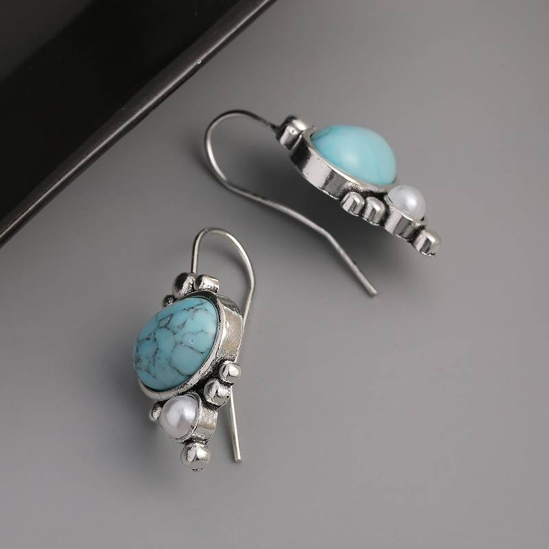 Boucles d'oreilles vintage en perles et pierres bleues