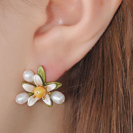 Boucles d'oreilles vintage en perles de marguerite